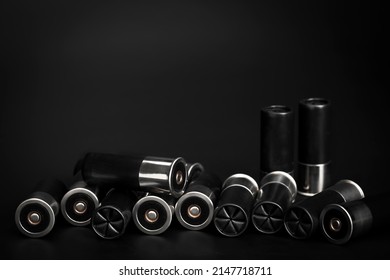 12 Gauge , Pile Of Shotgun Shell Ammunition On Black Background