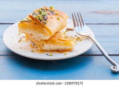 12 Gods Phyllo Pastry - Salty Feta Wrapped In Crunchy Phyllo Pastry With Honey, Black Sesame and Pistachio