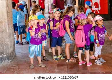 12 JULY 2018, BARCELONA, SPAIN: Group Of Children On An Excursion With Teacher