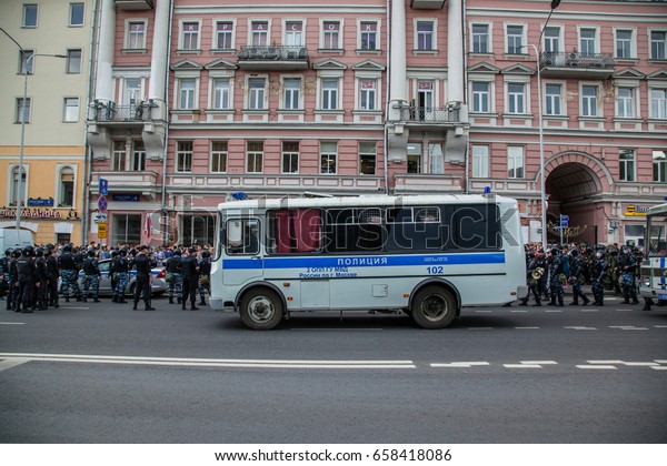 12 June 2017. Russia. Moscow. Tverskaya st.\
Meeting organized by Alexei Navalny against corruption in \
government. Heavy armored police forces holding and prohibit any\
action of people.