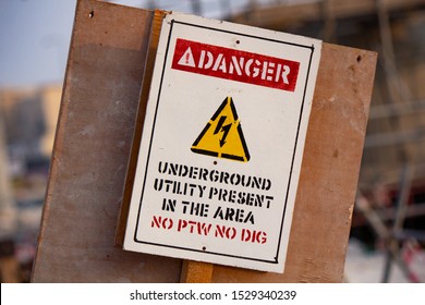 12 October 2019- Doha,Qatar- Underground Utility Present In The Area Sign Board In Construction