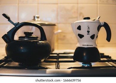 12 October 2019, Poalnd: preparing cappuccinoin in bialetti mukka express coffee maker in traditional vinatge kitchen
