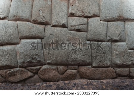 12 sided Inca Hatunrumiyoc stone, Twelve angled stone (La Piedra de Los Doce Angulos) of the ancient inca wall, Cusco, Peru