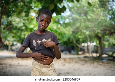 12.09.2022 Dominican Republic Macao. Portrait Of An Hungry African Boy. Slums.