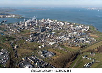 12-2-2022, Terneuzen, Holland. Aerial view of chemical factory of Dow Benelux in Terneuzen. In the back river Westerschelde and the city of Vlissingen.