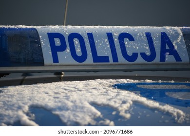 12.26.2021 Wroclaw, Poland, A Police Sign On A Police Car Of The Polish Police In Winter.