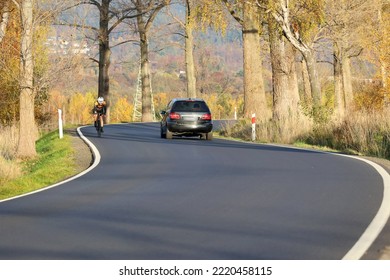 1-.27.2022 Wroclaw, Poland, A Winding Asphalt Road Will Run Through The Trees In Autumn.