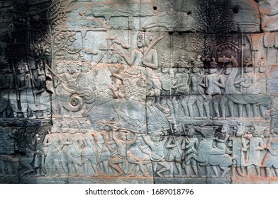 12th Century Bas-relief With Huge Army Of Khmer Kingdome Going To War, Inside The Bayon Temple, Cambodia. Historical Artwork On Wall Of Southeast Asian Landmark. UNESCO World Heritage Site In Angkor.