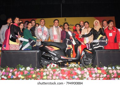 12th January 2018, Guwahati, Assam, India. Assam Chief Minister Sarbananda Sonowal And Education Minister Dr Himanta Biswa Sarma Give Away Scooter To One Thousand Girl Students.