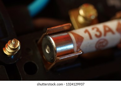 A 13 amp fuse inside a UK plug