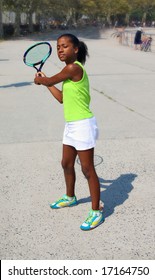 13 Year Old Girl Playing Tennis