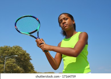 13 Year Old Girl Playing Tennis