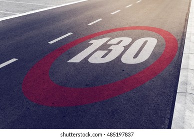 130 Kmph Or Mph Driving Speed Limit Sign On Highway, Road Safety And Preventing Traffic Accident Concept.