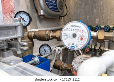 13/05/2020. Russia, Moscow,Norma Water Meter And Water Heater Polaris. Turn Off Hot Water. Plumbing Cabinet. Water Meters, Collector,  Pressure Sensor