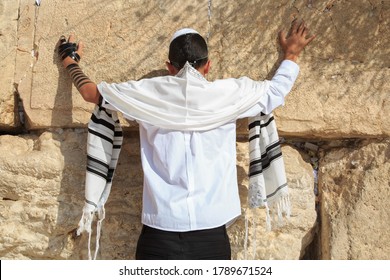 A 13-year-old Teenager Prays At The Western Wall. Bar Mitzvah Ritual