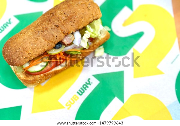 Subway Sandwich Menu at Subway Sandwich Restaurant Wallpaper. Subway is a Restaurant Franchise sells Submarine Sandwiches and Salads.