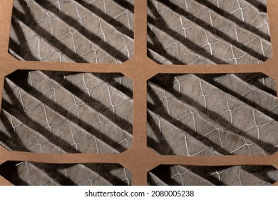 14 X 14 X 1 Size Dirty Home Air Filter Close Up That Needs To Be Replaced.