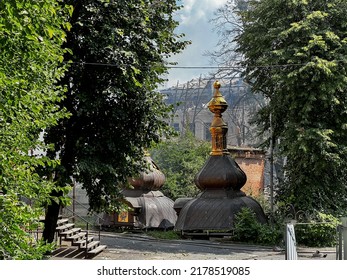 14.07.22 Vinnitsa, Ukraine: 
The Destroyed Orthodox Church Against The Background Of The Fire In The Officer's House Hit By A Russian Missile In The Center Of The City Of Vinnytsia