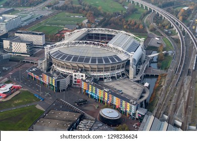 14-11-2018, Amsterdam, Netherlands. Aerial View Of Johan Cruijff Arena And Shopping Mall With Decathlon And Prenatal.  The Soccer Stadium Is Home Of Team Ajax And Will Host Games During The Euro 2020