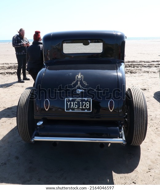 14th May 2022- A\
classic Ford Model B hotrod parked on the sandy beach at Pendine,\
Carmarthenshire, Wales,\
UK.