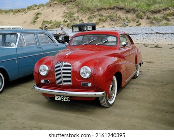14th May 2022- A customised classic Austin A40 Somerset, saloon car built in 1953, parked on the sandy beach at Pendine, Carmarthenshire, Wales, UK. 