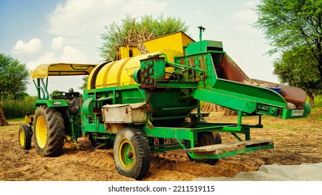 15 August 2022, Sikar, India. Grain Harvester With Thresher Tractor. Tractor With Thresher Machine Closeup In Agriculture Field.