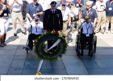 15-09-2019 Washington DC :  An US Army General Honoring World War 2 Solders With Veterans On Wheel Chair On His Sides. At World War Memorial