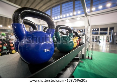 16 kilogram Kettlebells for exercise placed on shelf in gym