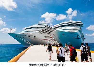 16/04/2011 - Caribbean Islands - Huge Cruise Liners In The Port With Blue Water Waiting For The Passengers To Come Aboard