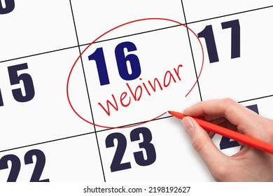 16th day of the month. Hand writing text WEBINAR and circling the calendar date. Webinar date on calendar or agenda. Day of the year concept. - Powered by Shutterstock
