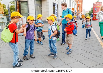 17 MAY 2018, BERLIN, GERMANY: Group Of Children On An Excursion With Teacher