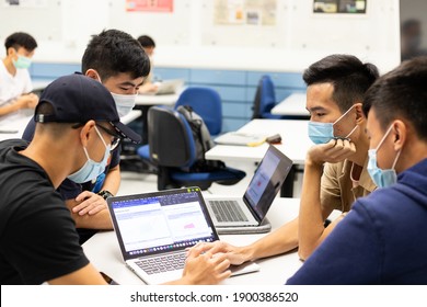 17-11-2020 Students With Face Mask And Computer Have Small Group Teaching And Discussion In Class Room In University In Hong Kong During Covid-19