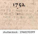 "1752" taken from a publication printed that year on rag paper. Some text from the reverse side is showing through