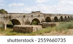 17th century bridge of the Austrias across the River Guadiana near Medellin (Spain)