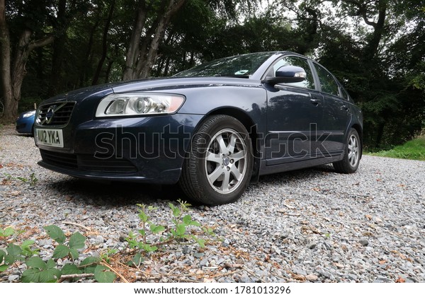 17th\
July 2020- A stylish Volvo S40 ES D2, four door saloon car, parked\
at a woodland near Amroth, Pembrokeshire, Wales,\
UK.