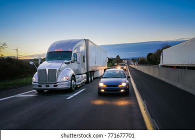 18 wheeler semi truck at night on highway
