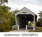 1870s Imes Bridge, a covered wooden bridge in Madison County, Iowa. Photographed in early autumn.