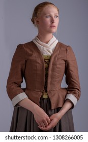 18th Century Woman In Brown Ensemble