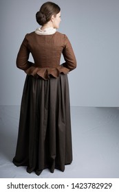 18th Century Woman In Brown Outfit