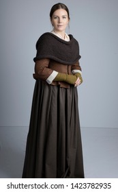 18th Century Woman In Brown Outfit