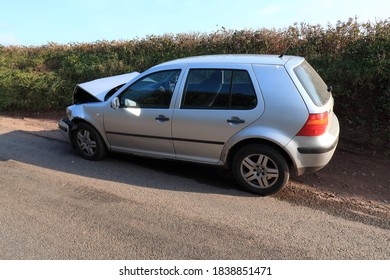 18th October 2020-A crashed Volkswagen Golf TDI SE, five door hatchback car left by the side of a country lane near Pendine, Carmarthenshire, Wales, UK.
