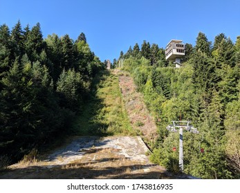 [19 AUG 2018 ; Borovets, Bulgaria] Abandoned Ski Jumping Ramp And Chairlift