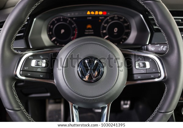 19 of January,\
2018 - Vinnitsa, Ukraine. Black Volkswagen VW Arteon presentation\
in showroom - interior\
inside