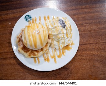 19 June 2019; Nonthaburi Thailand: Starbucks Waffle Caramel With Vanilla Ice Cream Top View At Starbucks Cafe Coffee Shop.