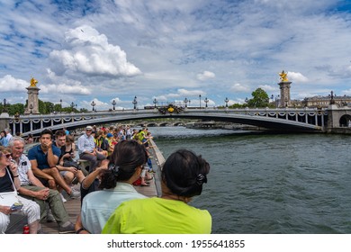 19 June 2019 - PARIS, FRANCE: Tourists Enjoying Boat Tour On Seine River In Summer Time