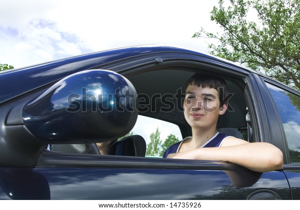 19 years old man driver in
a car