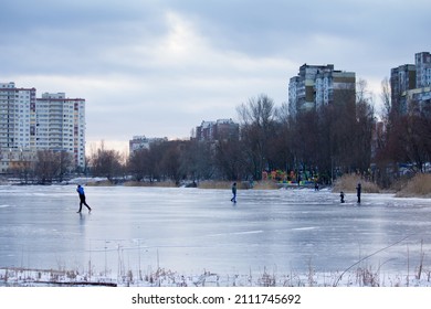 19.01.2022 Kiev. Ukraine. People Walk On The Frozen Lake. Thin Ice, Danger.