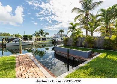 1905 Keystone Blvd, Miami, FL May 11 2021, USA
Oceanfront House With Open Views Of The Bay With Palm Trees And Neighboring Houses, Yachts, Beautiful Blue Sky And Tropical Plants