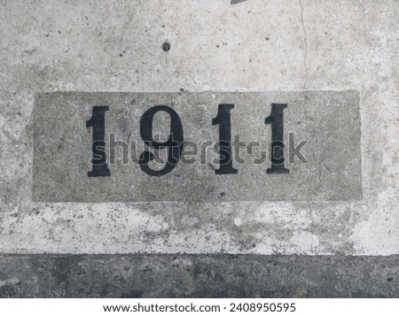 1911 - Brazil - Number 1911 carved into the floor of a historic heritage site