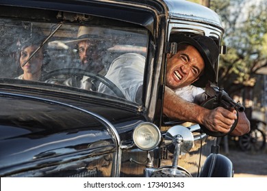 1920s Gangster Shooting Gun From Car Window